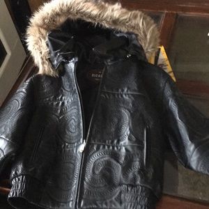 Never worn child’s leather bomber jacket. Measures 20” pit to pit. 19” long